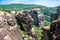 Top view of Monastery of Varlaam the second largest in Meteora, Greece, and the unique rock formations around it, above Kalabaka