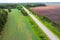 Top view of the movement of cars on the motorway through the forest