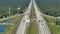 Top view of mulitlane american highway with rapid driving cars during rush hour in Florida. View from above of USA