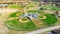 Top view multiple four baseball softball complex near nature park trails with bright fall foliage near Dallas, Texas