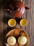 Top view of mung bean pastry and Oolong tea on wooden background. Flat lay. Taiwan food