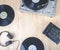 Top view of music player equipment on wooden desk