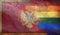 Top view of national lgbt retro flag of Montenegro with grunge texture, no flagpole. Plane design, layout. Flag background.