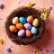 Top view of nest with Easter eggs and flowers, pastel colors