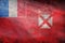 Top view of official retro flag Wallis and Futuna with grunge texture. travel and patriot concept. no flagpole. Plane design,
