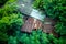 Top view of old abandoned house with rusted roof