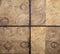 Top view of old rustic wooden plank made of cross section wood and divided in four squares