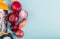 top view of onions with salt and grater on left side and blue background with copy space