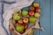 Top view of organic apples in eco friendly meshed shopping bag with white linen napkin. No waste, zero plastic, eco friendly,
