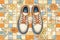 top view of orthopedic shoes on patterned tile floor