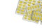 Top view of oval yellow tablets pills in blister packs. Yellow pills pattern wallpaper. Mefenamic acid tablets pills