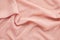 Top view over soft woolen pink textil texture