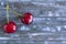 Top view of pair of cherries on wooden table