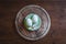 Top view of pair of eggs on rustic wooden plate