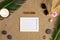 Top view of palm leaves on beach sand background. Flat lay.