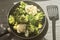 Top view of the pan with fresh defrosted vegetables: cauliflower, broccoli, brussels sprouts