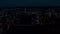 Top view of panorama of modern city at night. Stock footage. Glowing night city with modern buildings and high-rises