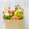 Top view paper bag of different fresh health food