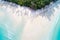 Top view paradise white sand turquoise beach with coconut palm t