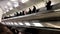 Top view of passengers in the subway station, public transport concept. Stock footage. Men and woman standing on the