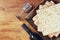 Top view of passover background. wine and matzoh (jewish passover bread) over wooden background.