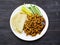 Top view of Peking Pork on plate on dark table