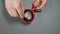 Top view of person hand stirring coffee with spoon. Close up.