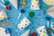 Top view photo of birthday party composition spiral cocktail tubes multicolored ribbon stars striped candles pipes hats confetti