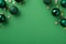Top view photo of green christmas tree balls small shiny stars golden star shaped confetti serpentine and sequins on isolated