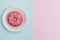 Top view photo of pink tasty bright sweet appetizing doughnut on