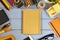 Top view photo of school supplies on wooden table