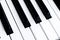 Top view of piano keys. Close-up of piano keys. Close frontal view. Piano keyboard with selective focus. Diagonal view. Piano keyb