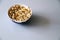 Top view of a pile of popcorn caramel popcorn in a plate on a glass table