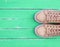 Top view of a pink pair of female leather sneakers