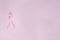 Top view of pink ribbon, symbol of breast cancer.Empty space for text