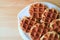 Top View of a Plate of Belgian Waffles on Served on Wooden Table, with Free Space for Text