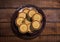 Top view plate full of chocolate round biscuits or cookies