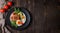 Top view of a plate with salmon and vegetables for ketogenic diet, low carbohydrate diet, the idea of conscious consumption of