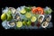 top view of platter of fresh oysters with lemon on a bed of ice on black background