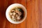 Top view Pork noodles, a popular local Asian food in Thailand, noodles with a wide variety of vegetables on the dining table.