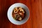 Top view Pork noodles, a popular local Asian food in Thailand, noodles with a wide variety of vegetables on the dining table.