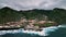 Top view of Porto Moniz town on Madeira island. Mountains on Madeira. Stormy Atlantic ocean near Madeira. Volcanic water