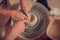Top view of a pottery wheel rolling