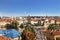 Top view of Prague, the Vltava river and the Charles bridge with crowds of tourists