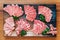 Top view of Premium Rare Slices many parts of Wagyu A5 beef with high-marbled texture on stone plate served for Yakiniku.