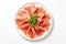 Top View Prosciutto Melone On Round Plate On Wihte Backgound