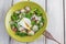 Top View on a Radish Salad with Poached Egg with Wooden Fork
