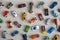 Top view random collection of model sport car toy hot wheels on wooden floor