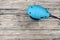 Top view of random orbital sander on wooden background