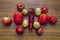 Top view of red bell peppers, potatoes, and tomatoes laying on the kitchen table